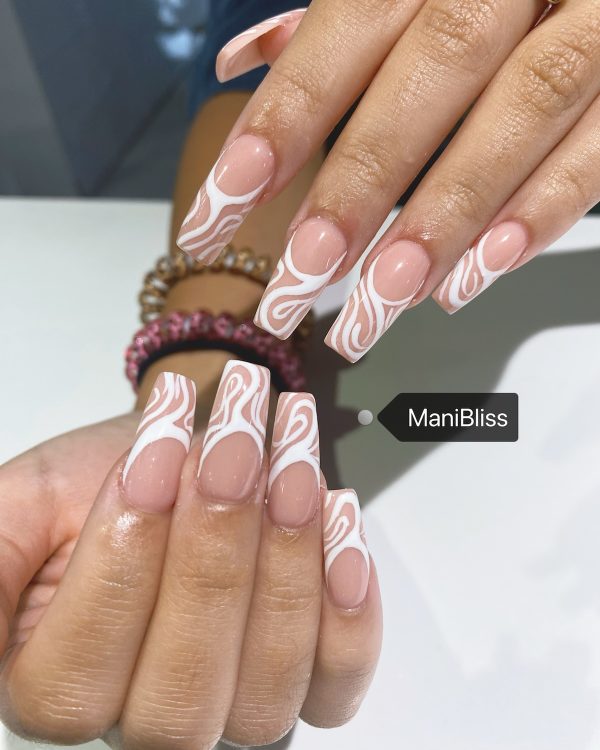 Nude pink base with white swirl French tip nail art on long square nails by ManiBliss nail salon Duluth GA