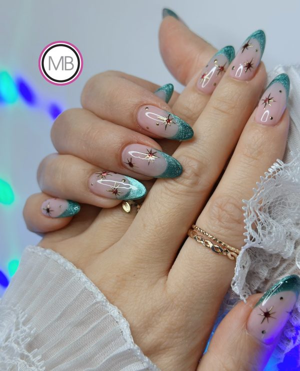 Teal mint glitter French tip almond nails with red starburst accents by ManiBliss nail salon Duluth GA